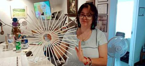 GRANTS, NM -- This ingenious sunburst wreath was made at the Saturday, September 7, Art Camp. Cibola Arts Council Art Director Thia Ray led the group in making this project, which is full of colorful possibilities. The straws glued to an embroidery ring can be decorated and colored with whatever entices its creators' imagination. Kathryn Marmon - CC