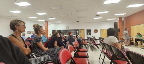 Townhall Over Grants Manager’s Contract