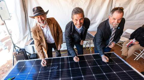L to R: Duane Highley, CEO Tri-State, Guy Vanderhaegen, CEO &amp; President Origis Energy, and Tim Rabon, Board Chairman Tri-State, sign a solar panel to commemorate the halfway point in construction of Escalante Solar Courtesy Photo