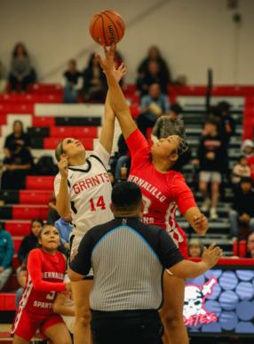 Kianna Guzman,14, reaches high in a jump ball at a recent Grants High School girls basketball game. The Lady Pirates went 2-1 at a recent tournament in the Four Corners and will host the Lady Sundevils of Espanola (4-4) on January 1. Franklin Romero - CC