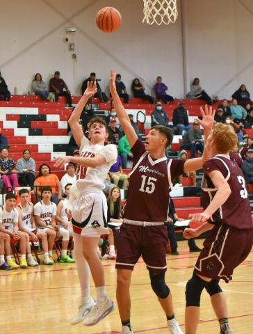 Sophomore John 'JJ' Horacek,20, of the Grants High School boys’basketball team takes it to the hole at the Eddie Pena Holiday Classic held this week at the Port of the Pirates. The Pirates lost the first game of the tournament, on Monday December 20, against the undefeated Magdalena Steers (9-0). Franklin Romero - CC