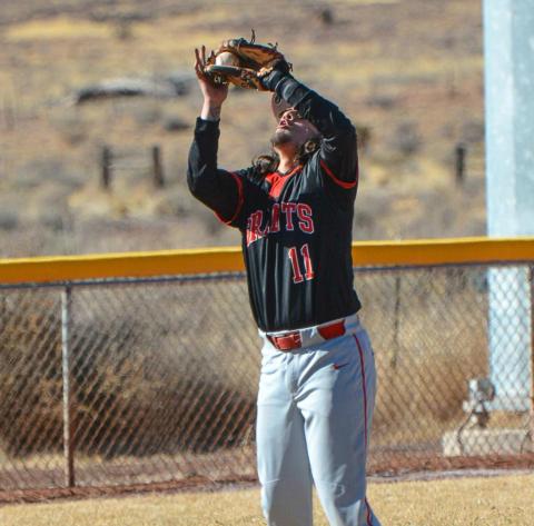 Sun in my eyes? What sun? Grants High School third baseman William Archuleta, 5, with an open sun fly ball catch for an out, this past Tuesday, March 8, in a home game against the Santa Fe Demons (0-4).head to Belen. Franklin Romero - CC
