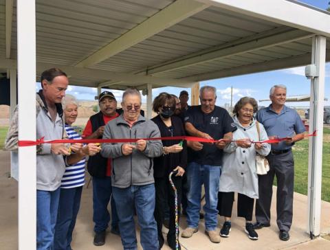 Current and former state legislators joined the Village of Milan government as they crowded together to cut the ribbon formally opening the improved Kearns Field. The local park is being outfitted to be better for recreation and give local children a safe place to play. Diego Lopez - CC