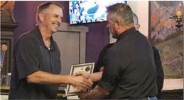 Ty Detmer receives plaque from Mayor Erik Garcia Arieanna Crowson - CC