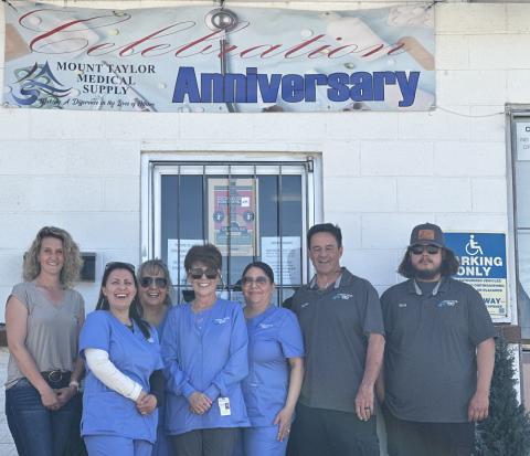 Staff members of Mount Taylor Medical Supply pose in front of their storefront on Friday, April 11, during the company’s 30th anniversary open house. The longtime Grants business marked the milestone with free hot dogs and community appreciation as part of their celebration. Diego Lopez - CC