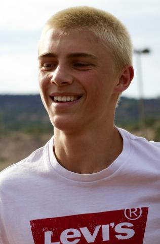 Junior Glade Gerber smiles during boys soccer tryouts on Aug. 10 at Grants High School in Grants, N.M. Jay Langford-Student Journalist