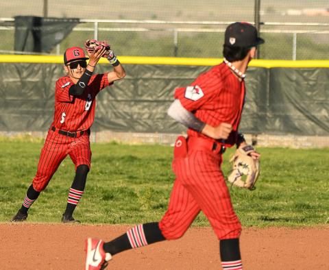 Pirates to state! The Grants High School baseball team received a second seed to the 4A state baseball tournament and will host the 16th seeded Portales Rams (12-11, 3-6) this weekend in a best of three games series. The Pirates came in first place in district 5 4A and amassed a record of 20-6 and 7-1. In this photo, Estevan Barela, 6, catches a fly ball in a recent district game against the Belen Eagles. Franklin Romero - CC