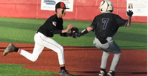 Hit! Catch! Out! GHS pitcher Estevan Barela beats a Miyamura runner to first base for an out. The Pirate handily defeated Miyamura 11-0 last week and then went on to defeat Kirtland Central in a double header 9-2, 22-1. Franklin Romero - CC
