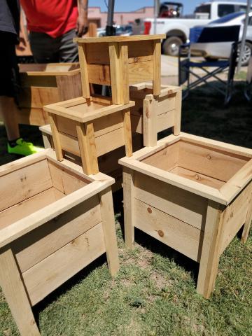 Rustic wooden planters are among the many handmade goods available at Saturday’s market — perfect for garden starts or patio accents. Courtesy Photo
