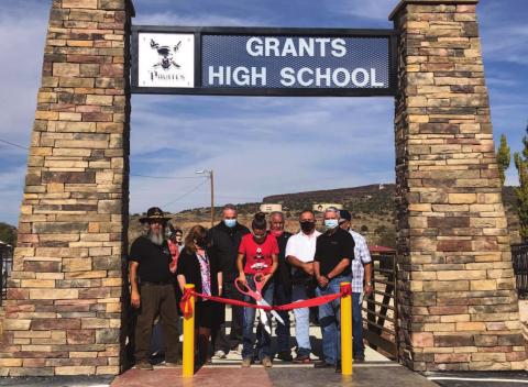 “City [of] Grants officials wanted the person who cut the ribbon to represent the most frequent users of the bridge, Grants High School students. Kristina Simpson was just that person. She is a great allaround student and athlete,” City of Grants Projects Coordinator Donald Jaramillo said as Simpson cuts the red ribbon signifying the opening of the new pedestrian bridge. Diego Lopez - CC
