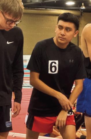 Senior John Paul Miller readies himself at a recent indoor track meet in Albuquerque. Miller is a top competitor in the 800 meter and 1600-meter races. Franklin Romero - CC