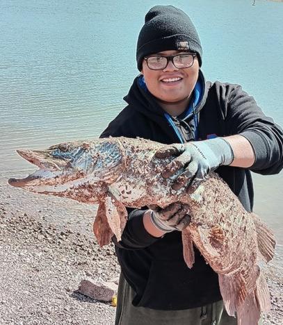 Patrick Dyea caught a tiger muskie using PowerBait on March 17. It was his biggest catch to date, following a 20minute battle to land the fish. Courtesy Photo