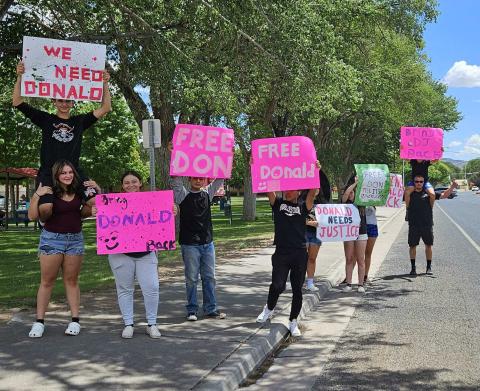 A crowd gathered in front of Grants City Hall at 600 W