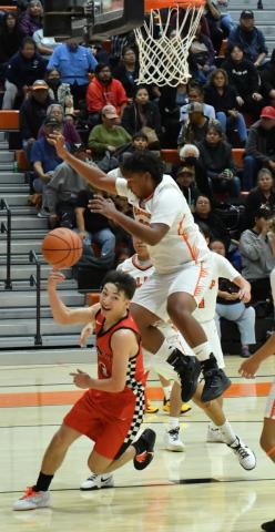 Sophomore Daniel Garcia, 13, takes it to the hole at a recent game against Gallup High School in Gallup. The Pirates went 2-1 at a recent tournament in Bernalillo and will head back to the 82nd Annual Gallup Bengal Invitational this weekend. Franklin Romero - CC