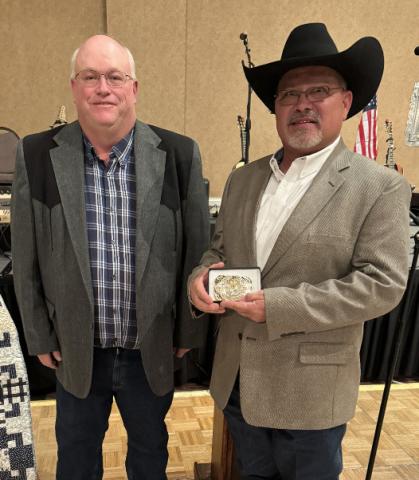 President Bronson Corn, left George Mendoza, right Courtesy