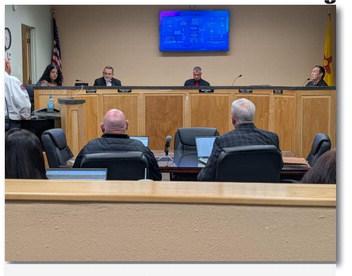 Grants City Council members listen as Fire Chief Mike Maes presents plans for advancing Grants Fire Rescue to paramedic-level ambulance services during the December 18 council meeting. The council approved investments in emergency medical training and partnerships with the University of New Mexico to enhance public health response capabilities.