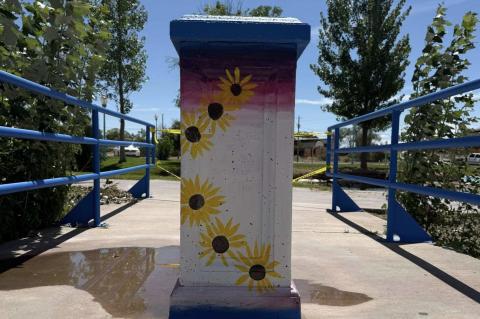 A pillar at Riverwalk Park brightens with hand-painted sunflowers, part of the Grants MainStreet Project’s mural initiative involving students and community volunteers to beautify the City of Grants’ parks and downtown area. Courtesy Photo