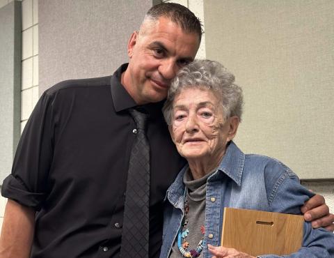 In April 2025 Jamie Holton was honored by the Grants City Council for her commitment to the City of Grants and The Rodeo Grounds. The City of Grants presented Holton with a plaque, thanking her for years of service to the community. In this photo from that meeting, Grants Mayor Erik Garcia hugs Holton close, in a message he wrote, “I really wanted to name that arena after her,” and expressed admiration for her leadership across the City of Grants. Courtesy Photo