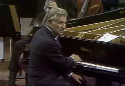 Bernstein is playing the chromatic scale, 12 notes used by Liszt to describe Faust. Photo by Trine and YouTube.com