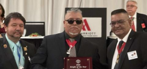 State Program Director Sean Romero, left, stands with Chris Madrid Jr., center, after Madrid was named Knight of the Year at the New Mexico Knights of Columbus State Convention. Madrid is the first member of the local Knights of Columbus chapter to receive this honor. Also pictured is State Deputy Anthony Salazar, right. Courtesy Photo