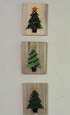 The Cibola Arts Council holds regular events for the community and especially children to get their creative sides moving. The efforts by CAC include their most recent event where area artists created these string art Christmas trees. Courtesy Photo