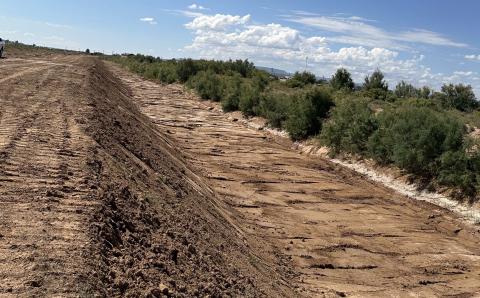 A section of the Rio San Jose near the George Hanosh Bridge shows the results of clearing work by City of Grants crews. Mayor Erik Garcia said approximately one mile of the river channel has been cleared of dirt, weeds, litter and other debris in preparation for anticipated monsoon rains. Diego Lopez - CC
