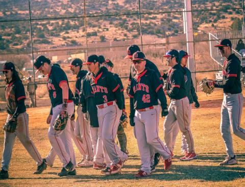 The Grants High School Pirates head to the dugout at a recent home game. The Pirates are 10-6 as they head into district play this week. "There's always work to do," said GHS Baseball Head Coach Walter Sarracino as the discussed the start of district play. Franklin Romero - CC