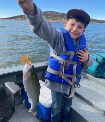 Westtin Dibble and Ben Pilcher hauled in eight rainbow trout during a family fishing trip. Courtesy Photo