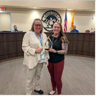 Acacia Gardner was recognized as the GIS Specialist of the Year, a surprise nomination by The Specialist Estates director of 911. Her expertise in GIS mapping, emergency addresses, and understanding easements has played a significant role in supporting the state and local communities. Amerika Rougemont - CC