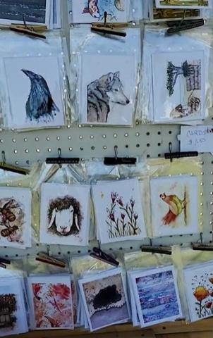 BookMarks – Handmade and designed book marks and apparel on display at the Grants Farmers Market. Diego Lopez - CC