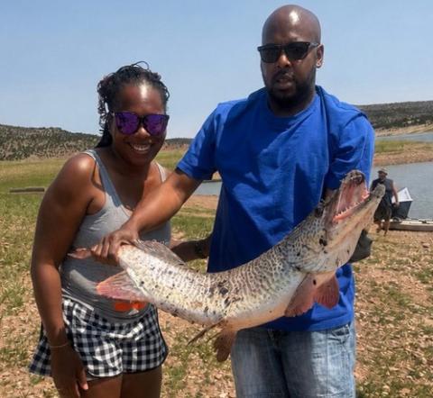 Kristl Walker landed a tiger muskie while on a camping trip on July 11, using nothing more than a hot dog for bait. Courtesy Photos
