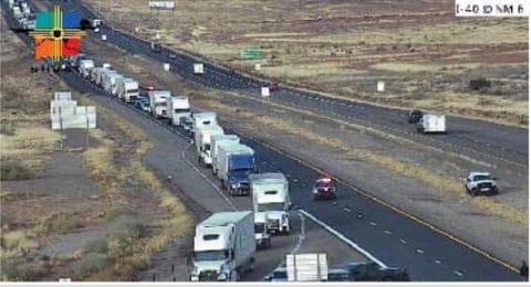 Courtesy: NMDOT traffic camera Traffic backs up near the I-40/NM 6 (Exit 126) interchange west of Albuquerque as New Mexico State Police investigate a fatal crash and divert drivers off the interstate.