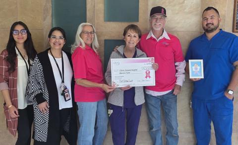 Members of Cibola General Hospital’s mammogram team and admin staff accept a $2,650 donation from Roger and Evelyn Siegmann following the Second Annual Pink Ribbon Rally for a Cause at Ed Corley Ford in Grants. The Siegmanns and volunteers organized the October 11 event to raise breast cancer awareness and support the hospital’s mammogram program. From left: Nydia Sanchez, Cynthia Tena, Evelyn Siegmann, Marie Stafford, Roger Siegmann, and Manny Garcia. Photo by Roger Siegmann