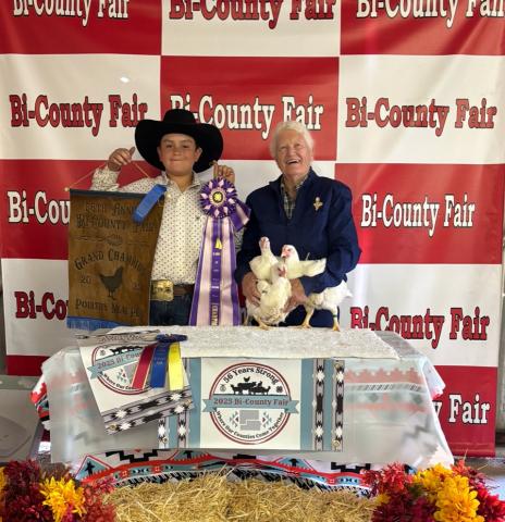 Rowdy Reyes with the Grand Champion Broiler Meat Pen and he is the Grand Champion Poultry Showman Courtesy Photo