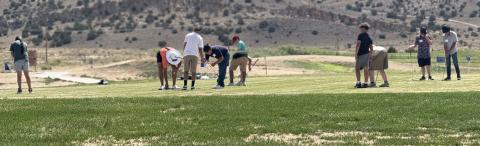 Young golfers gather at the Coyote Del Malpais Golf Course in Grants for the annual Kids 4 Golf Clinic, hosted by staff and volunteers to teach the fundamentals of the game and share a love of the sport.