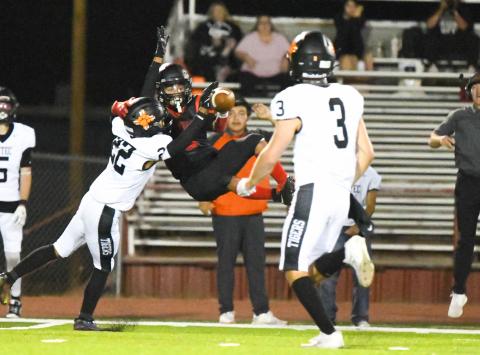 The Grants High School Pirates have earned a seventh seed to the Nusenda Credit Union 4A state football playoffs. They will host the 10th seeded Silver Colts on Saturday, November 9 at 1 pm at the Port of the Pirates. The Pirates ask fans to wear red and to fill the seats early. 'This is a big game for us,' said GHS head football Coach Steve Brown. In this file photo Boudy Melonas battles for a catch with a recent opponent.