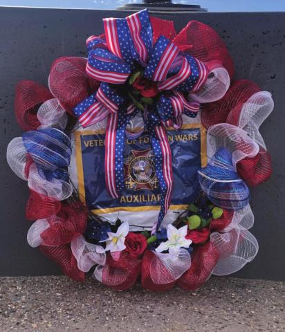 Diego Lopez - CC The Veterans Day wreath is laid on the monument in Veterans Park on Nov. 11, as a socially distanced crowd of veterans and their families watched.