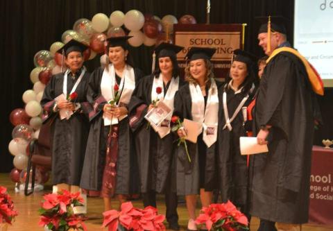 Bachelor of Science in Nursing Graduates, left to right: Andrea Blatchford, Nicola Casamero, Yolanda Ramirez, Savannah Torrez, Tuyen Vo, Former Faculty Cindy Torres, College Assistant Professor, Terrel Pearson. Kathryn Marmon - CC