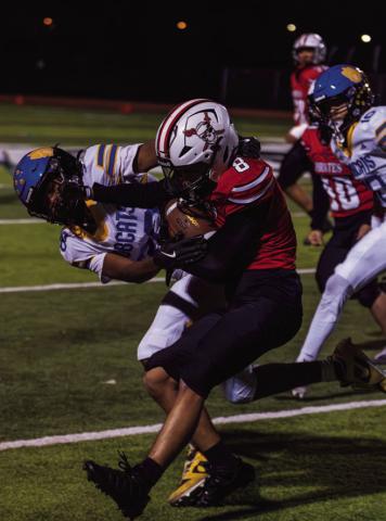 Grants High School sophomore Julian "JuJu" Fernandez carries the football while attempting to escape a Bloomfield defender during a home game at GHS on October 16, 2026. Jay Langford- Student Journalist