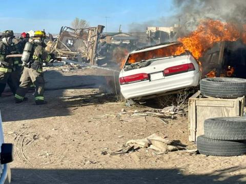 A fire just outside the Village of Milan on April 14 threatened to create a large blaze. Thanks to the quick reaction by Cibola's firefighters the fire was not allowed to grow larger. Courtesy Photo