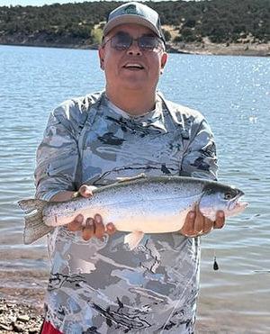 Michael Sage caught four trout using Salmon Peach PowerBait on May 26. “My pole was bending like crazy on the initial takedown, so I thought I landed a catfish or even a muskie,” he said. “It was pulling drag hard on the reel-in. The sheer girth of this fish was astonishing.” Courtesy Photo