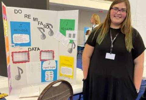 Faith Valdez, 10th grader at Grants High School, loves to sing and titled her experiment “Do Re Mi Fa So,” examining hand symbols and music. Courtesy Photo