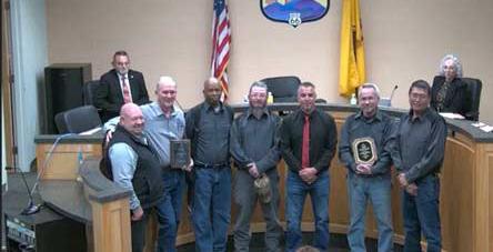 Left to Right: City Manager Andrew Valencia, Robert Hays, Alvin Dorsey, Felix Valdez, Mayor Garcia, Jack Frame, and Harrison Charley. Waste Water Treatment Plant awards recognition. City WWTPAward Courtesy Photo