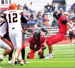 Noah Lundstrom,33, kicks a field goal last week in the homecoming football game against the Gallup Bengals (2-0). Lundstrom was six of six in field goals and extra point attempts this game. The Pirates are 1-1 currently and will play in a home game this Friday, September 1 at the Port of the Pirates against the Bloomfield Bobcats (2-0). Franklin Romero - CC